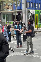 Videographer Real Rukshan, aka Rukshan Fernando, filming in Melbourne’s CBD this week.